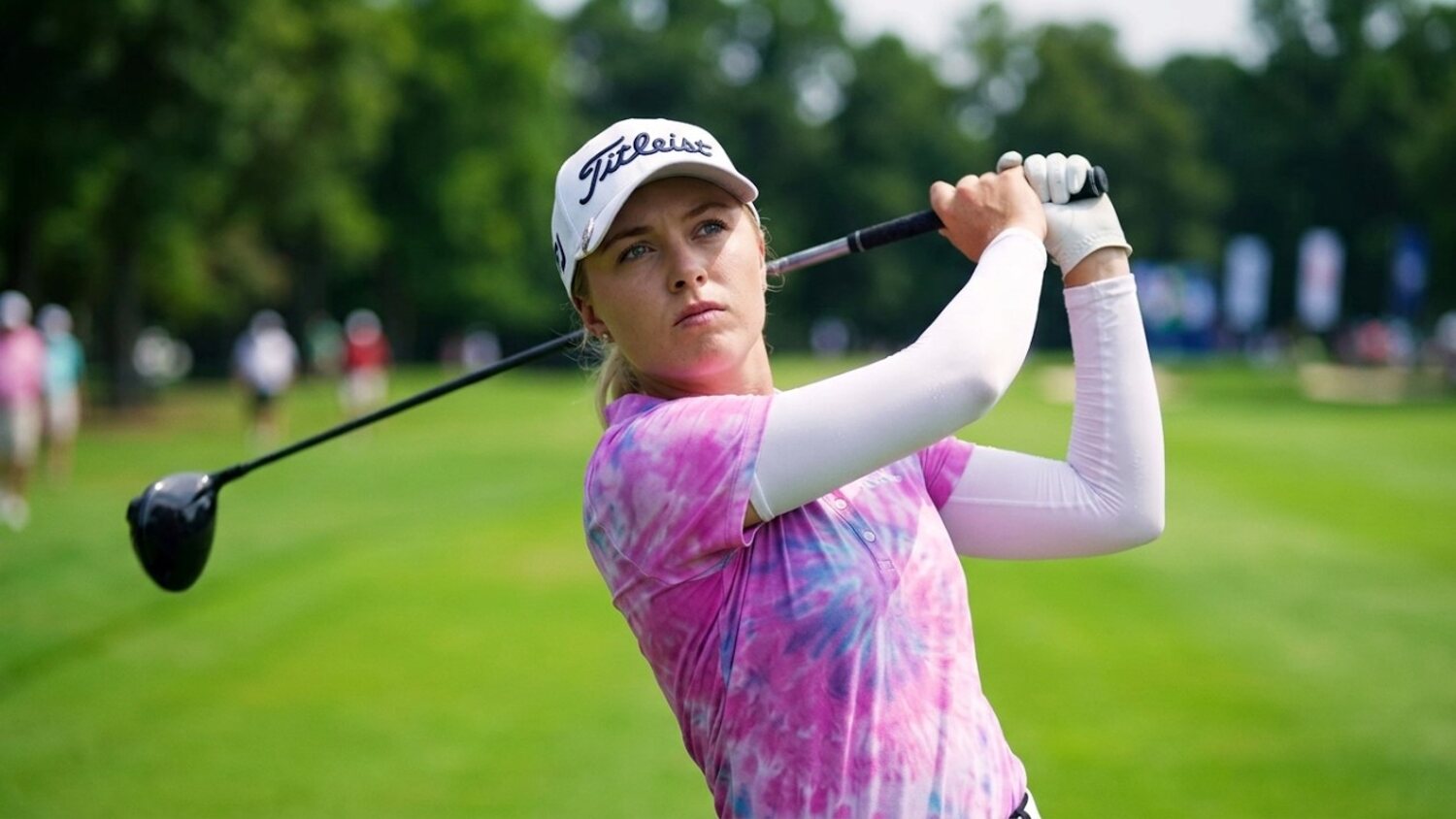 A professional golfer mid-swing at the Blue Asset Golf Pro-Am 2024