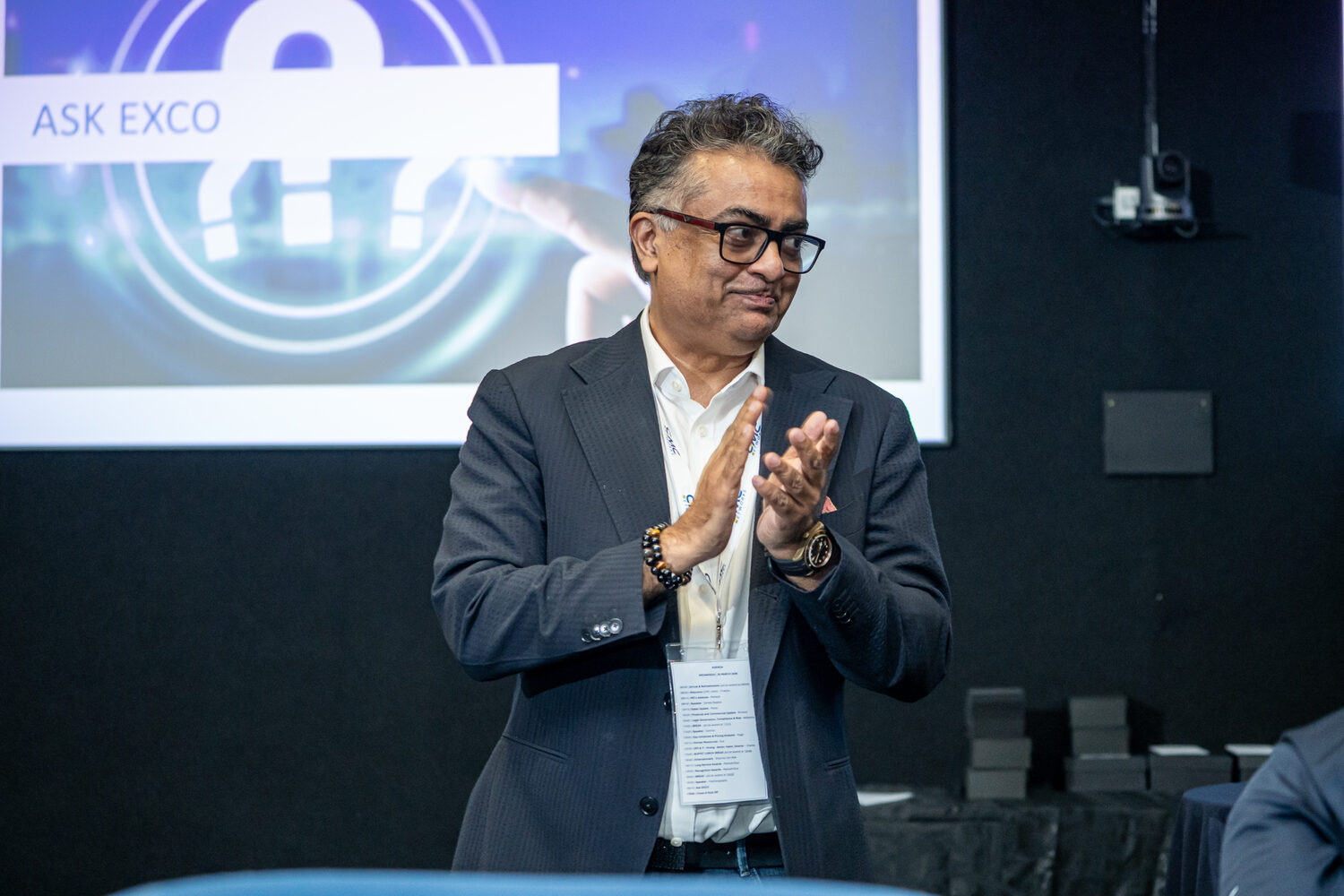 A delegate applauding during the 2026 programme