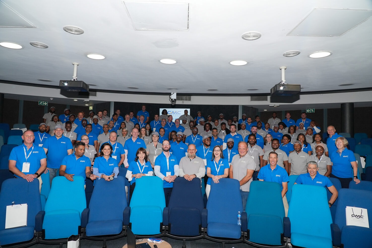 The full-company group photograph at Empower 2025