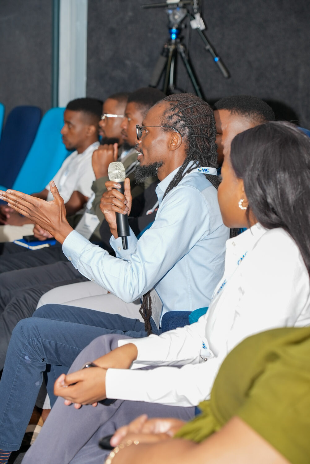 Employees laughing during a session at Empower 2025