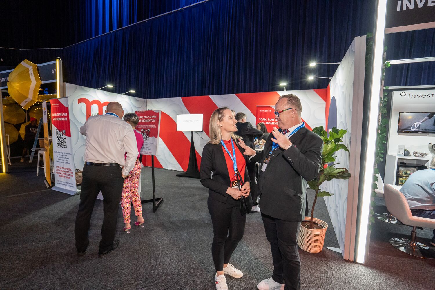 Guests talking in the exhibition area