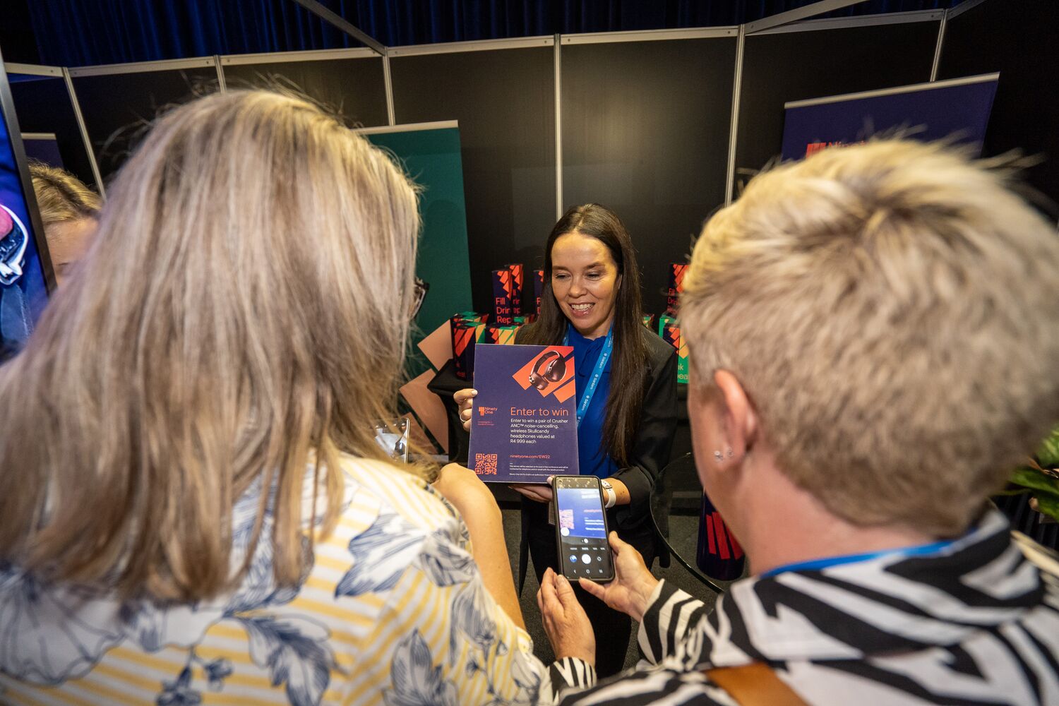 Guests engaging with an exhibition activation
