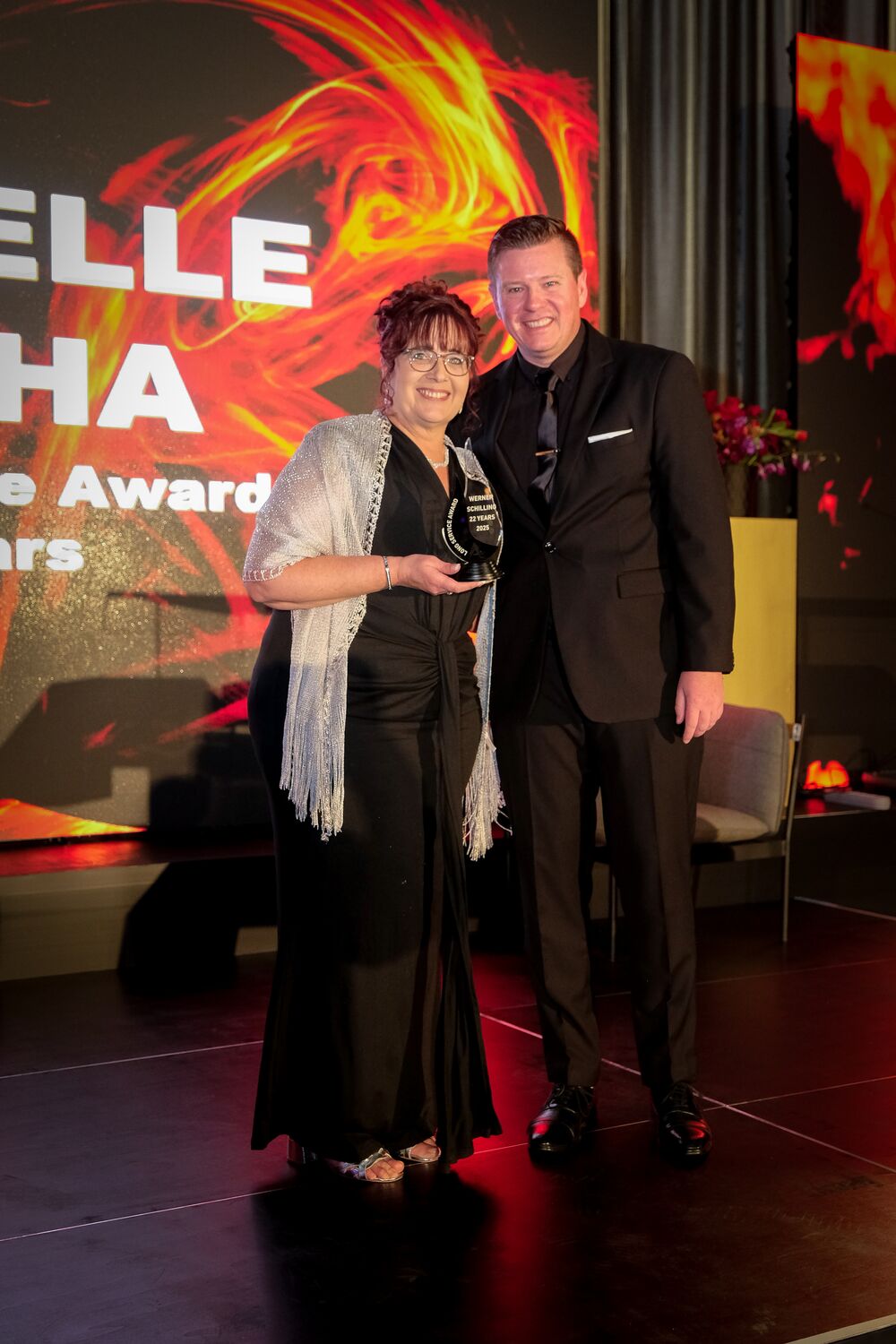 An award recipient photographed after receiving her award