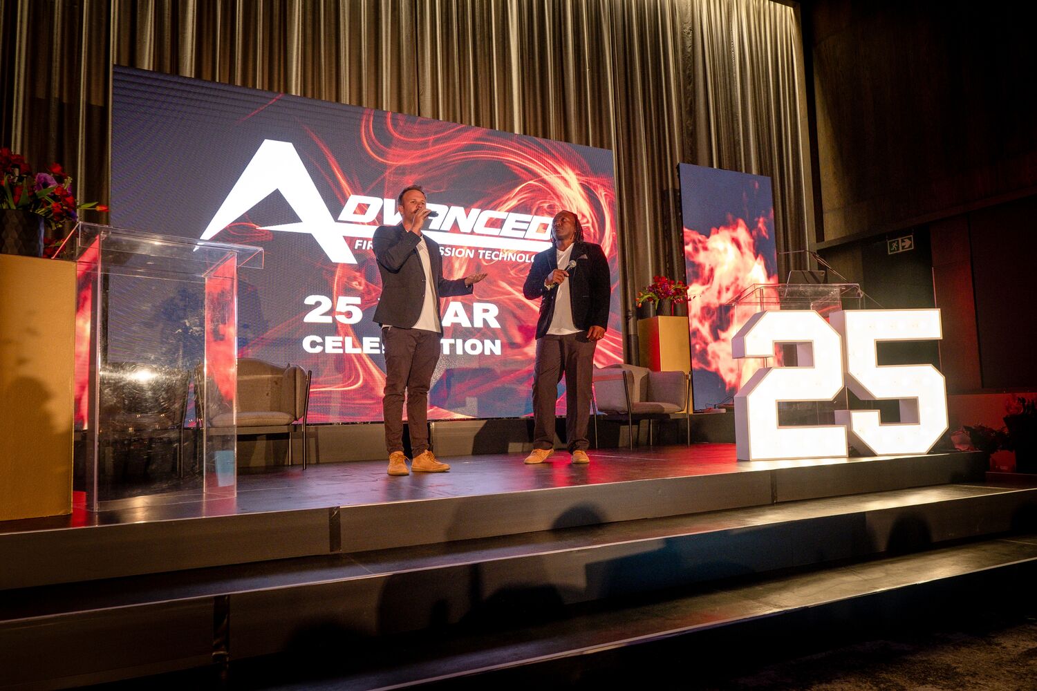 The stage and anniversary branding during the programme