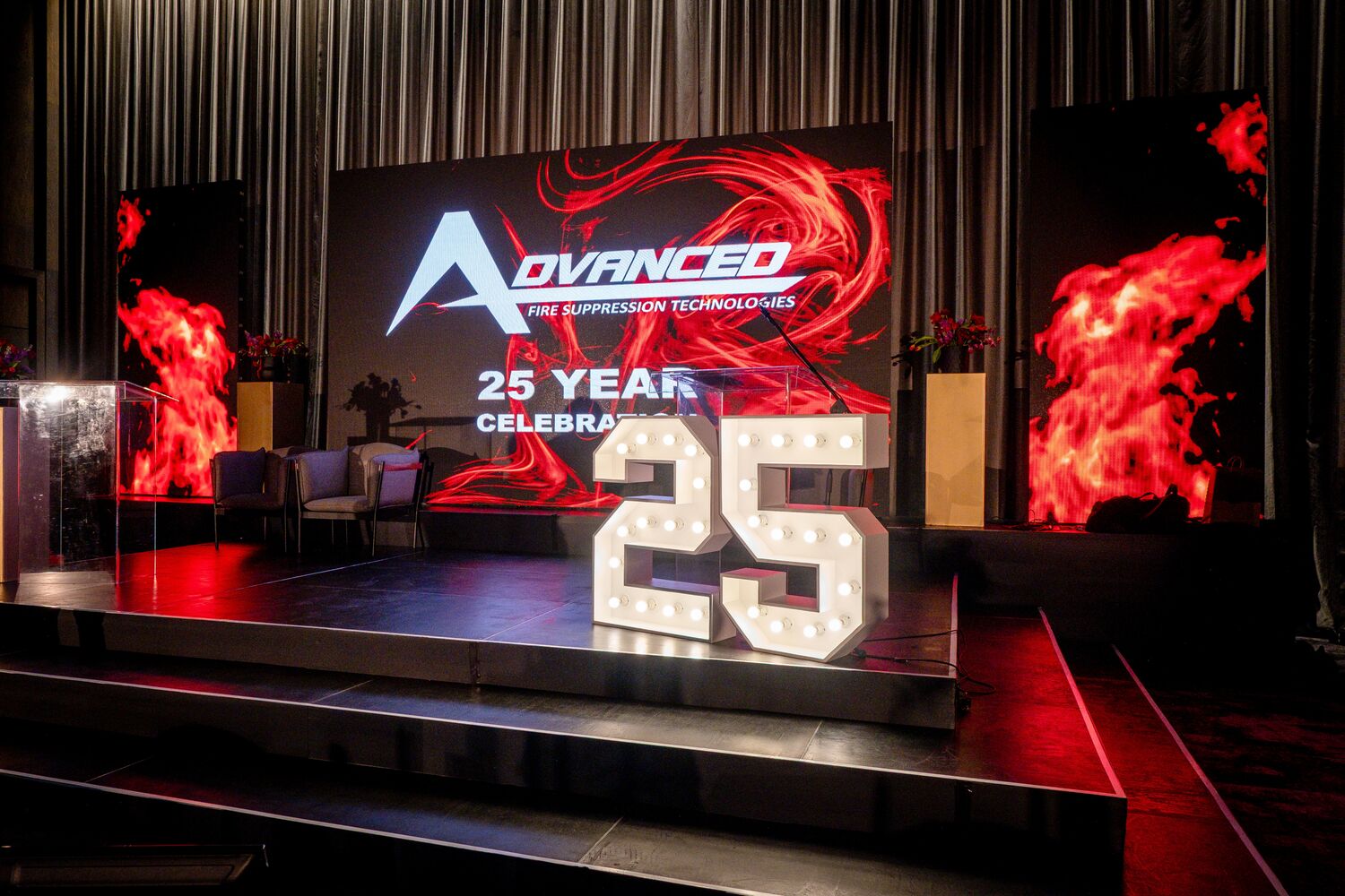 The gala dinner venue with 25-year anniversary branding