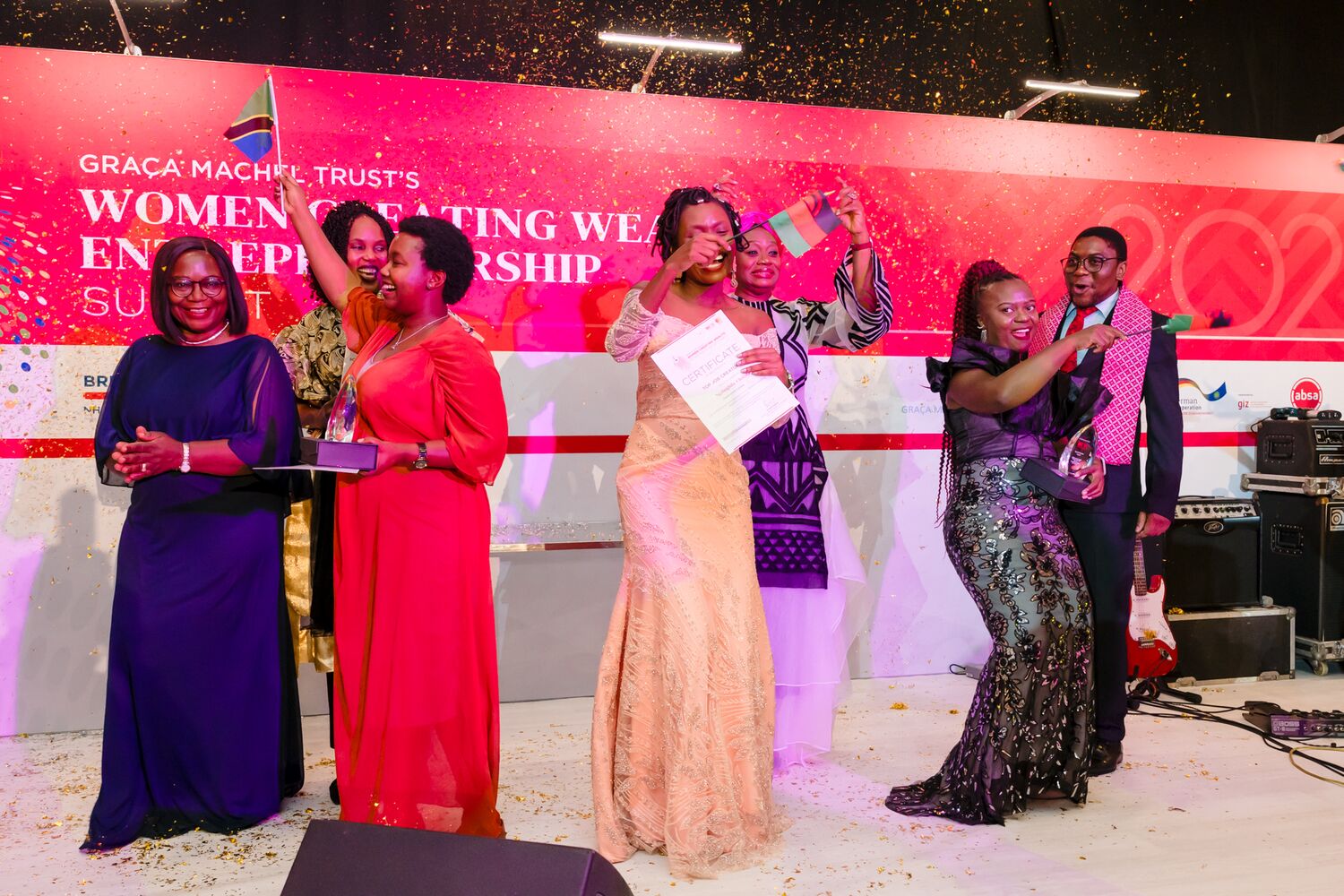 Award recipients on stage at the gala dinner
