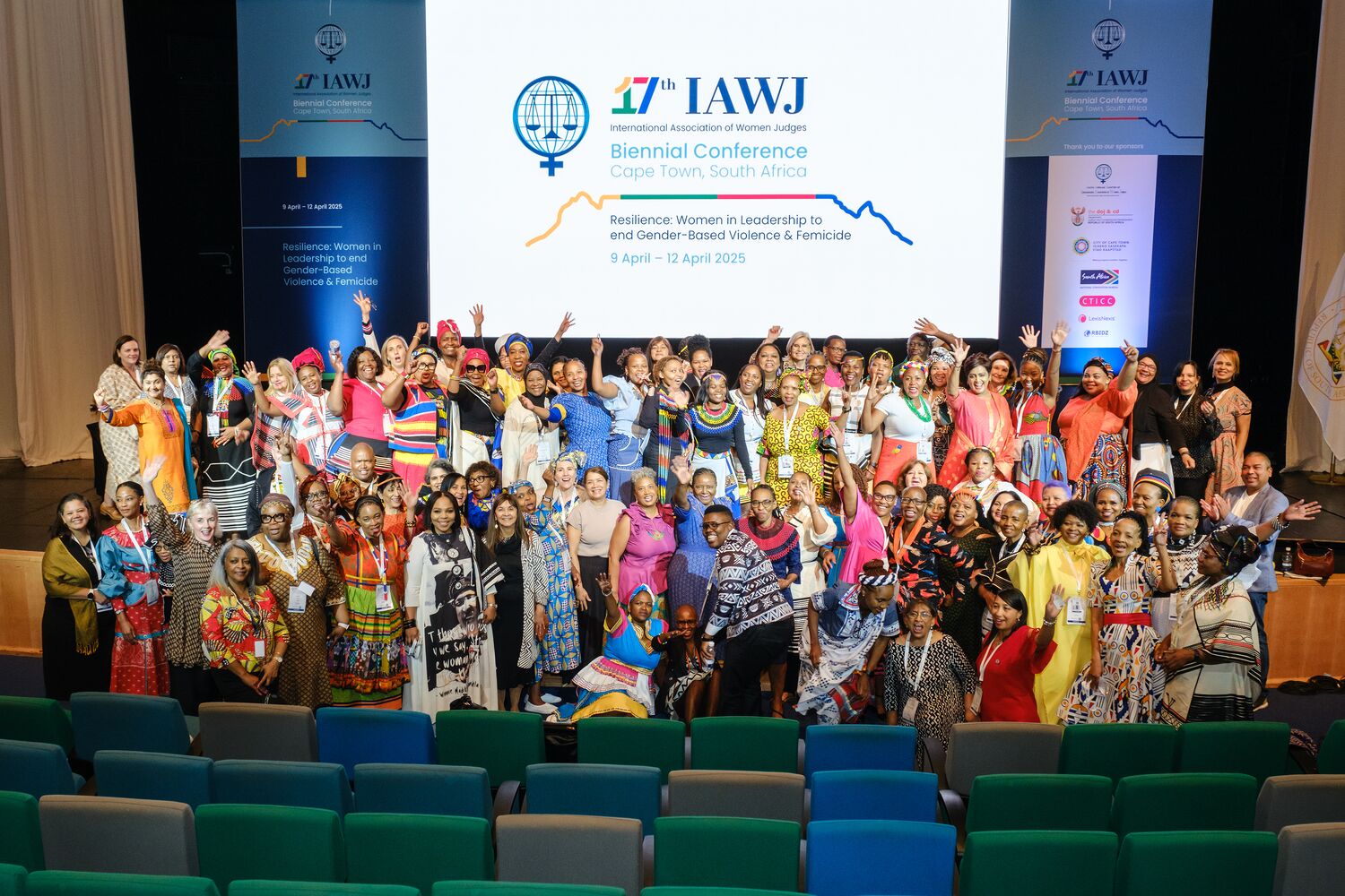 A candid group photograph of women judges at the conference