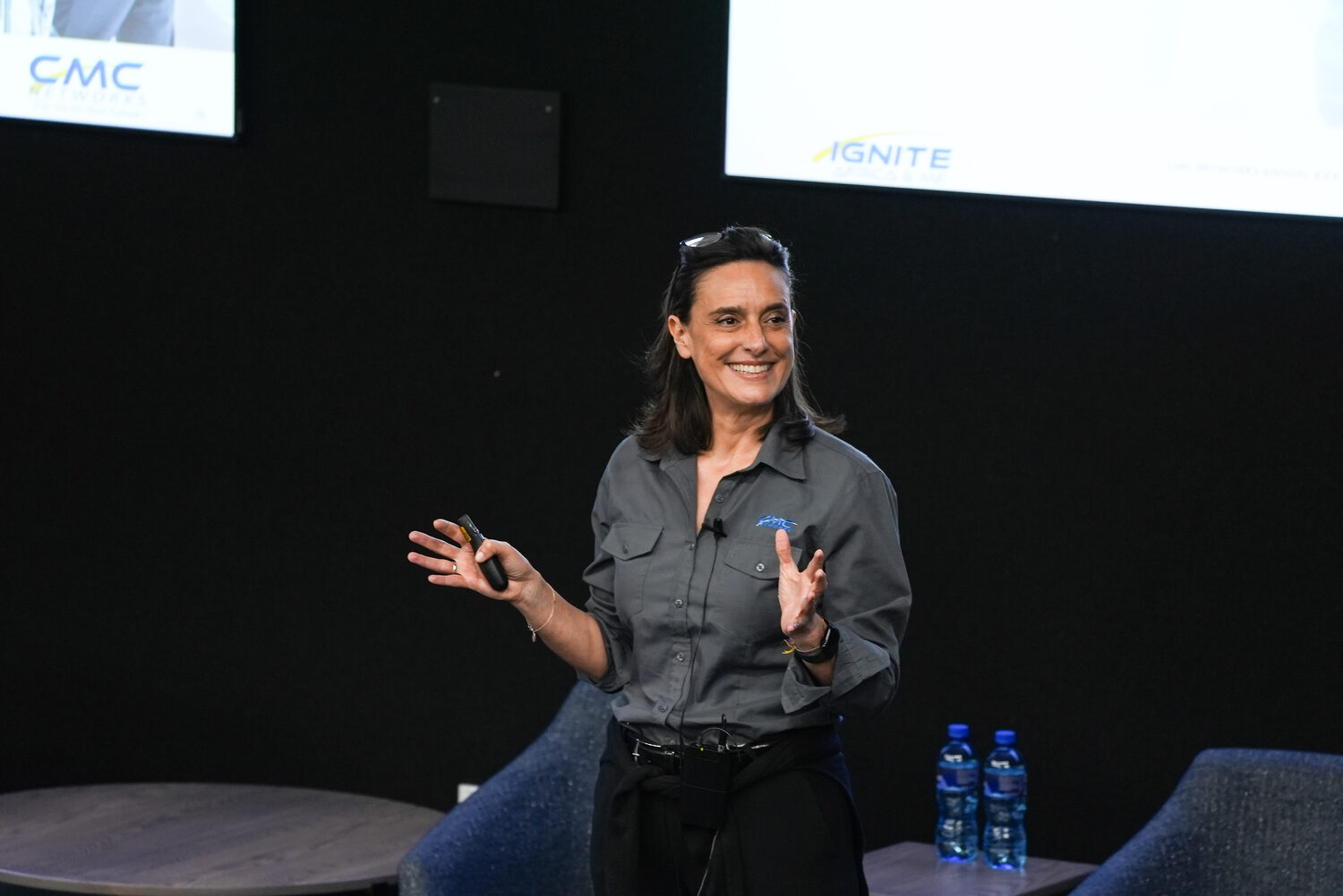 A speaker addressing the Ignite 2024 conference