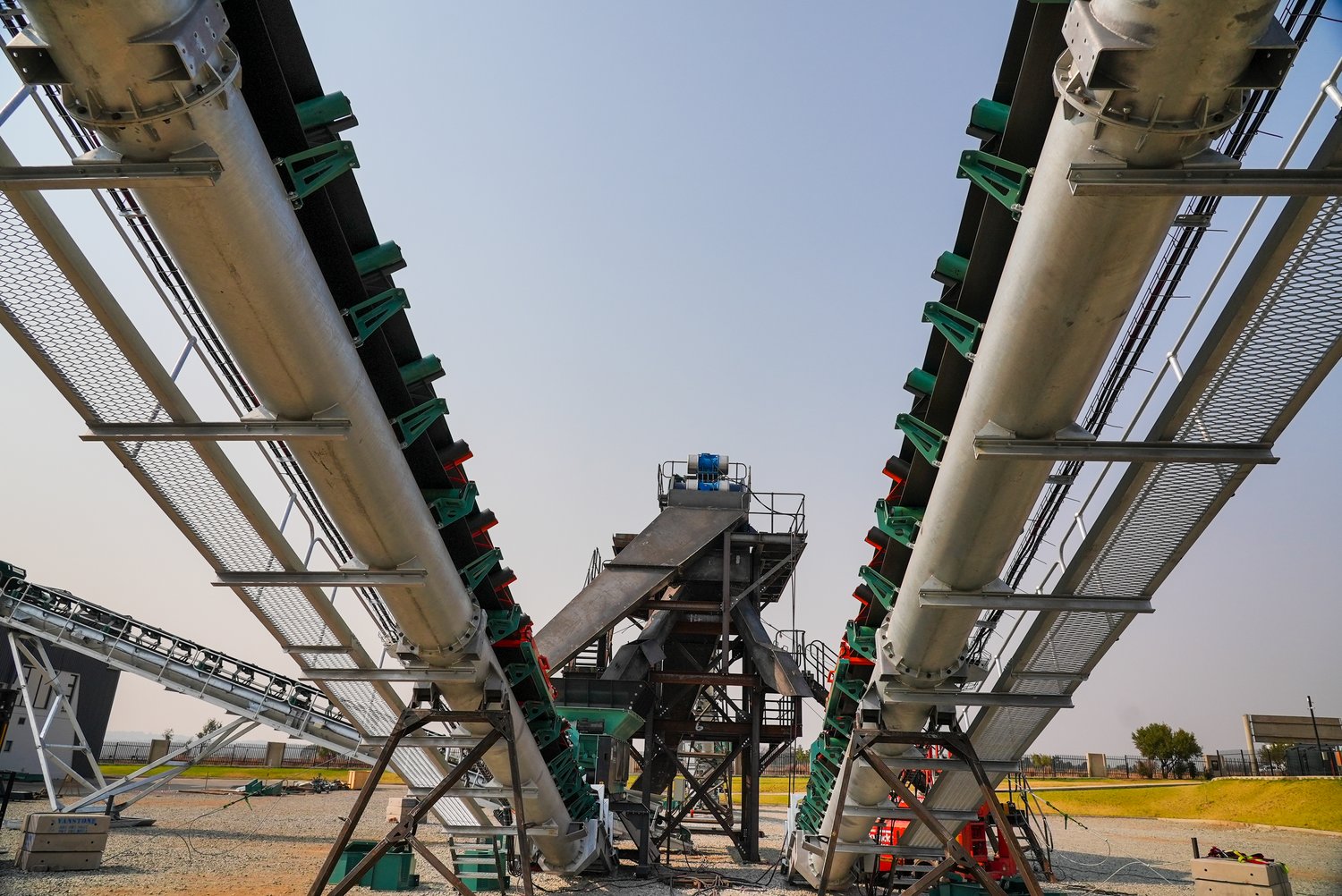 Low-angle view along the plant's conveyor lines