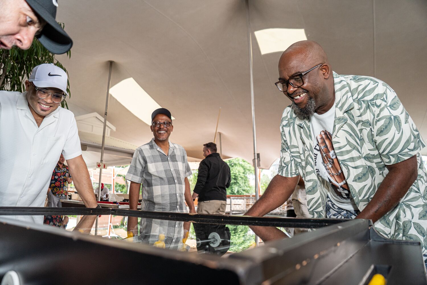 Employees playing pool at JTI Men's Day 2025
