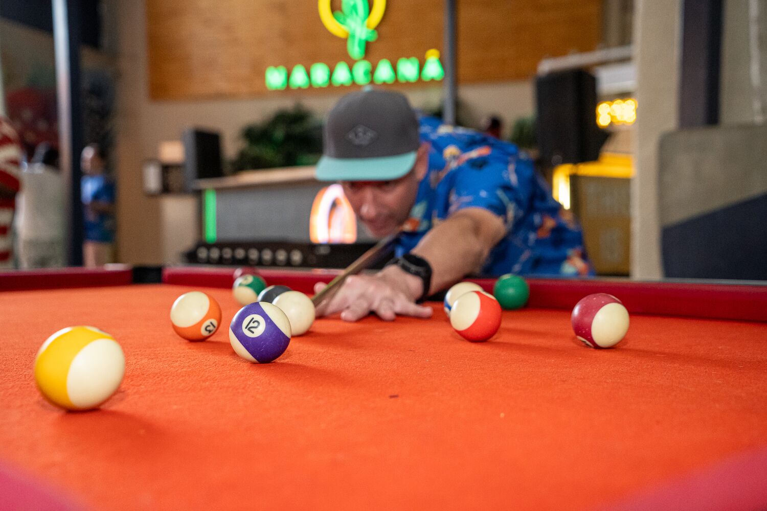 A game of darts during the Men's Day event