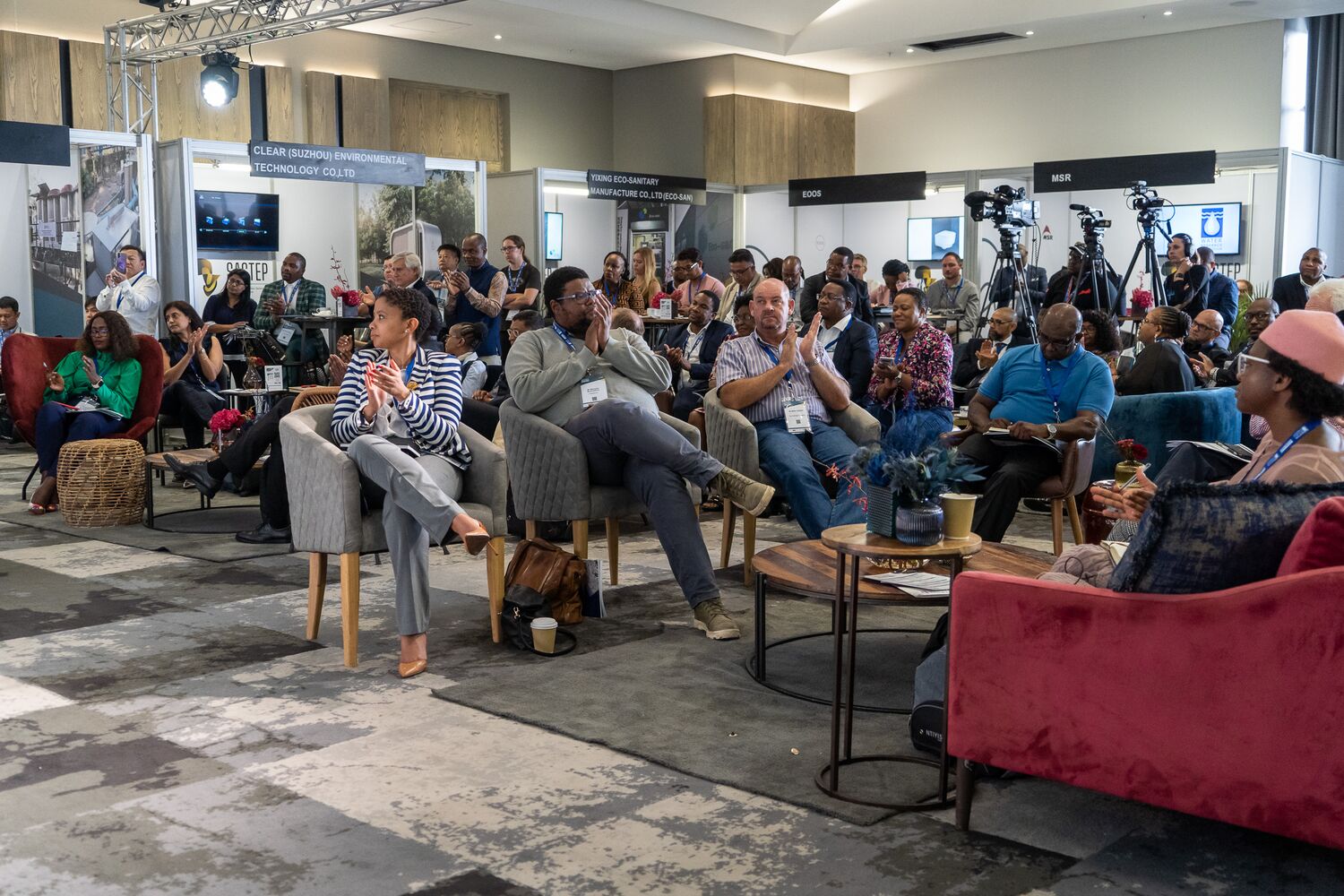 Delegates seated during a conference session