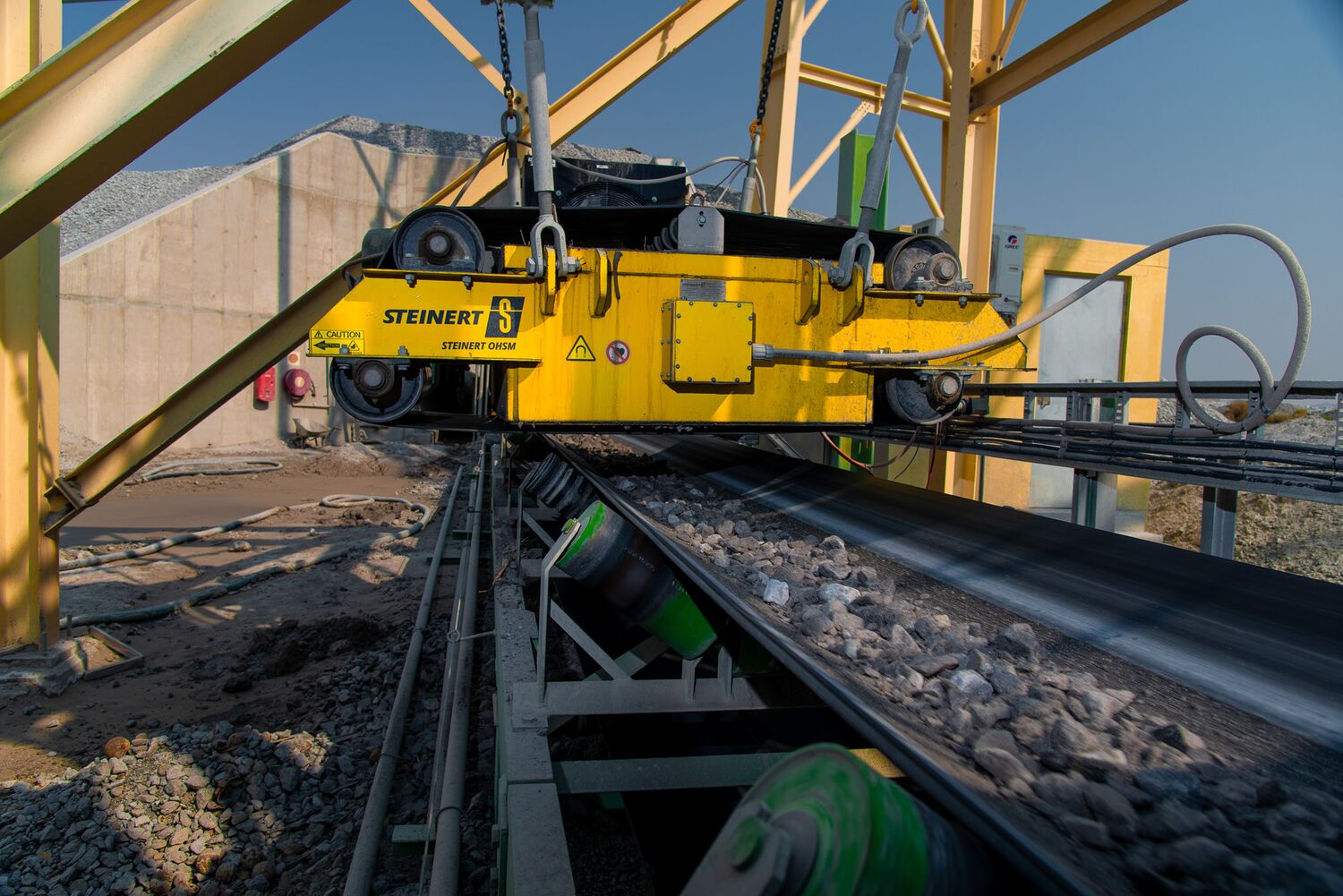The sorting mechanism processing ore on the conveyor