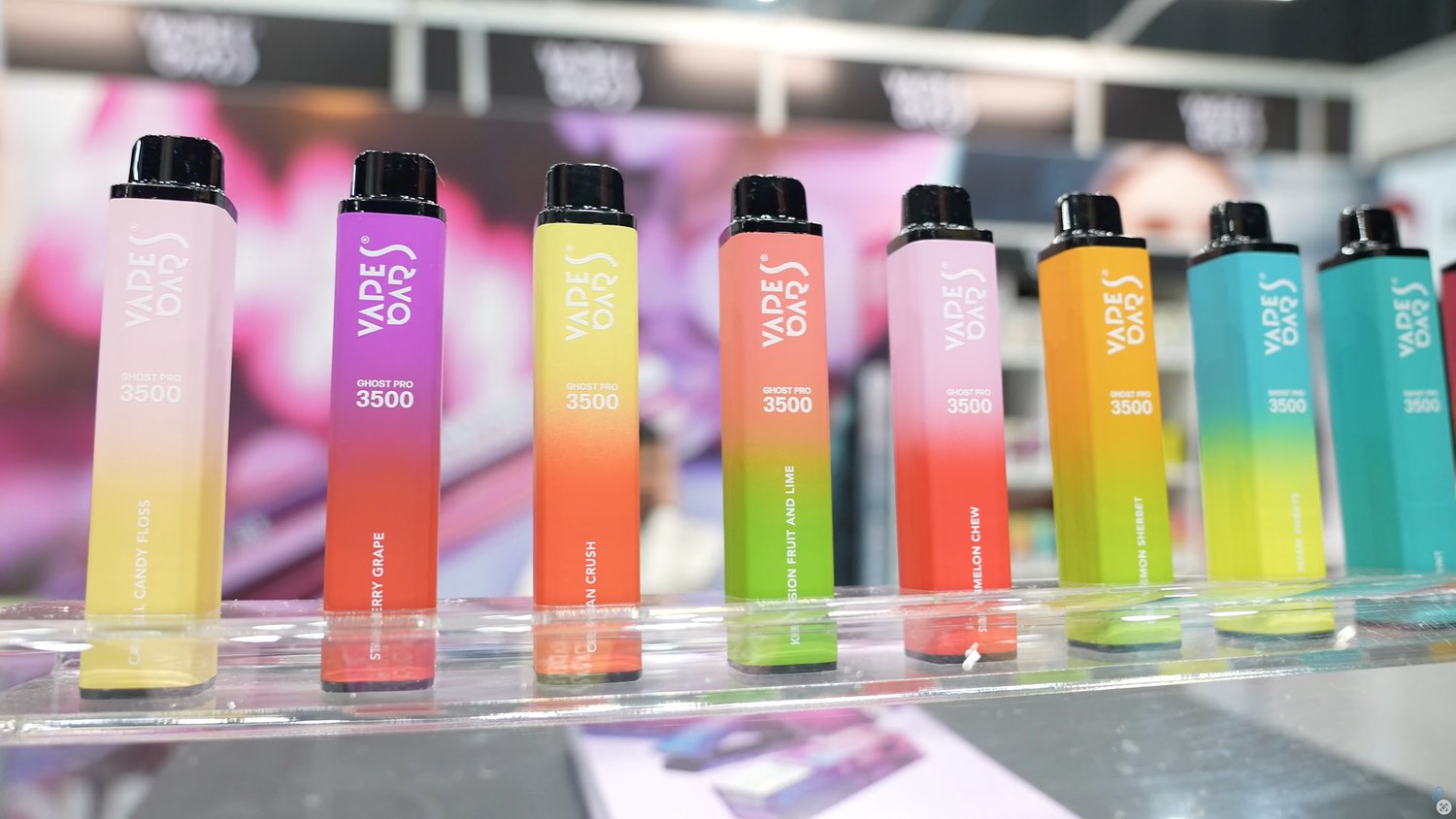 A colourful exhibitor product display on the VapeCon show floor