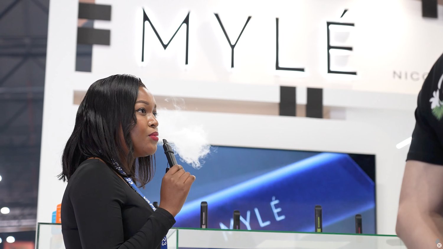 An attendee interview at a brand stand on the exhibition floor
