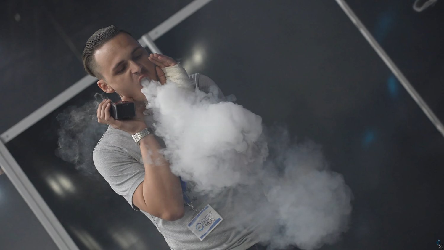 A competitor exhaling a large cloud during the cloud competition