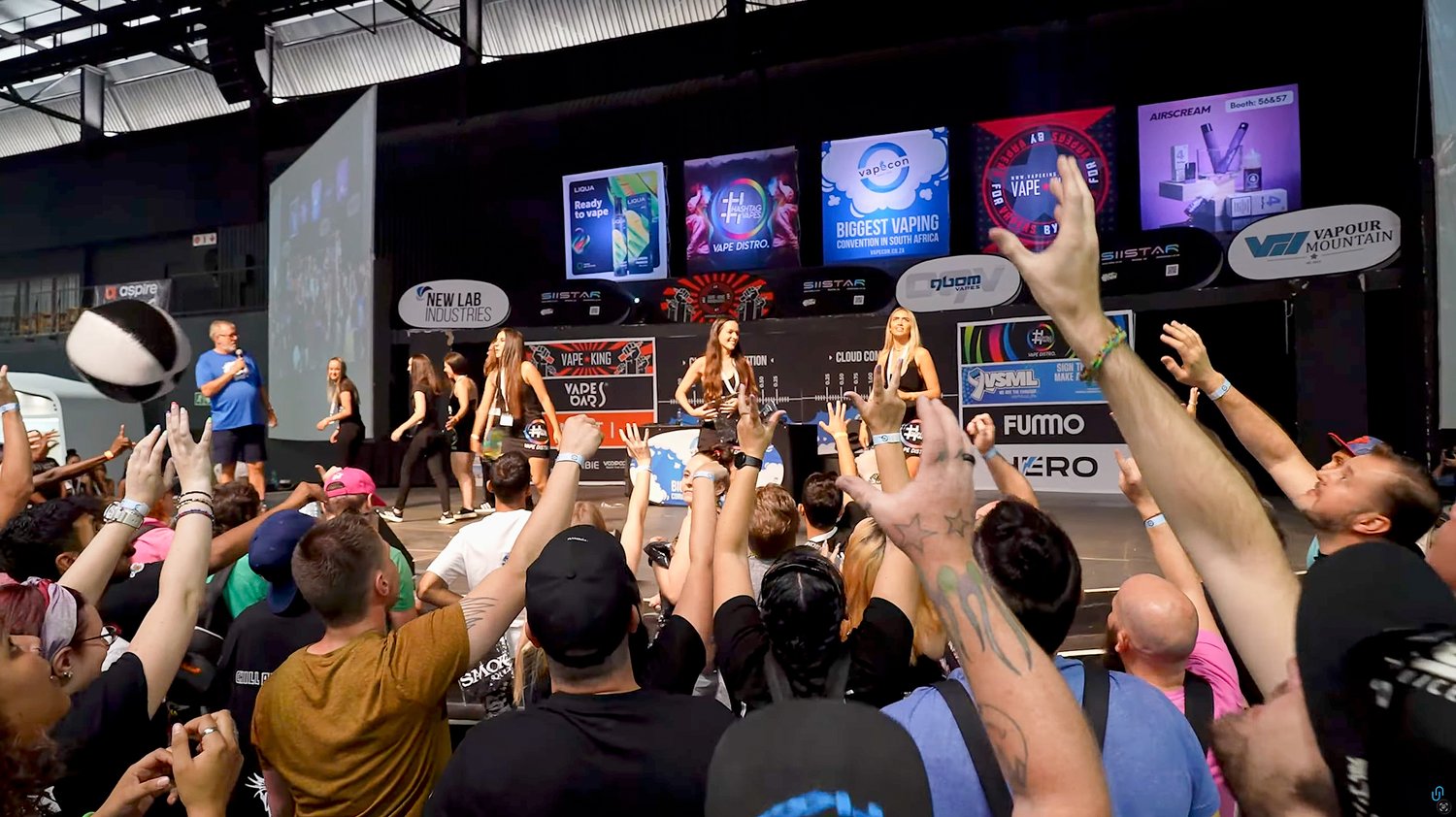 The main stage and crowd during a VapeCon giveaway