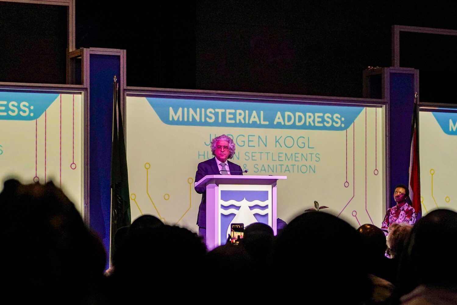A ministerial address delivered from the symposium podium
